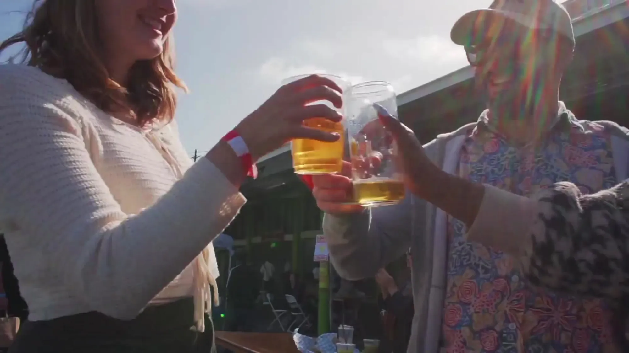 Festival-goers raising beers at Chimaek Festival